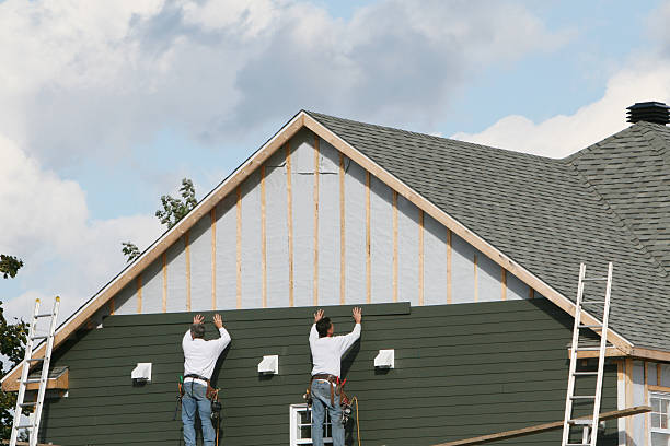Professional Siding technician working in Milford, NJ